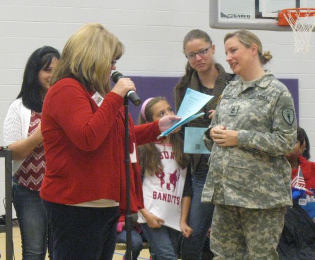 Iddings Elementary School makes Veterans Day a banner event